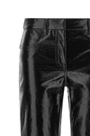 the courrèges trousers redefine the classic silhouette through a glossy finish