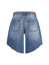 bermuda shorts with embroidered edges and pom pom detailing