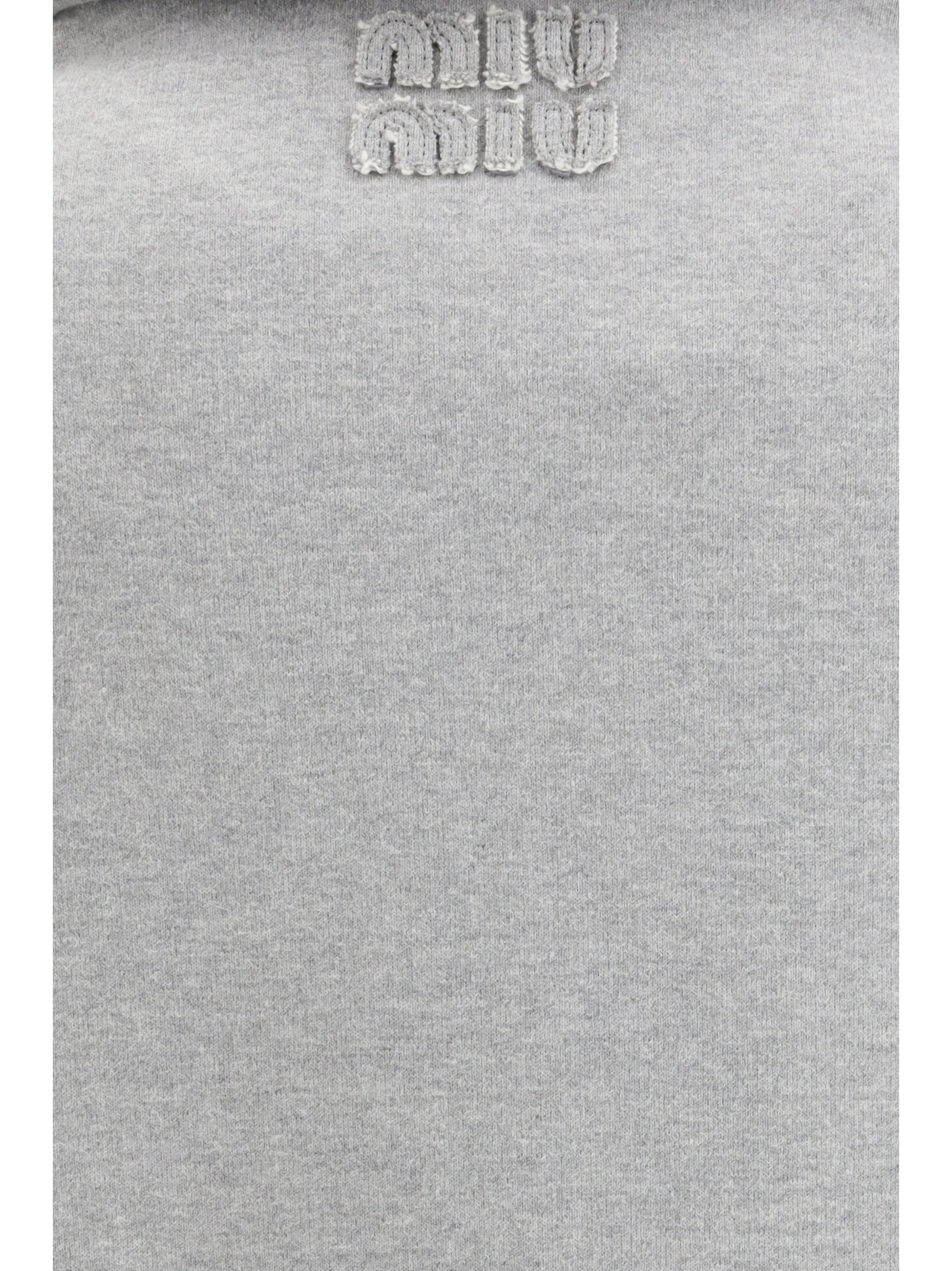 sweatshirt with oblique zip closure