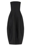 the long khaite stela dress defines a new architectural proportion through its