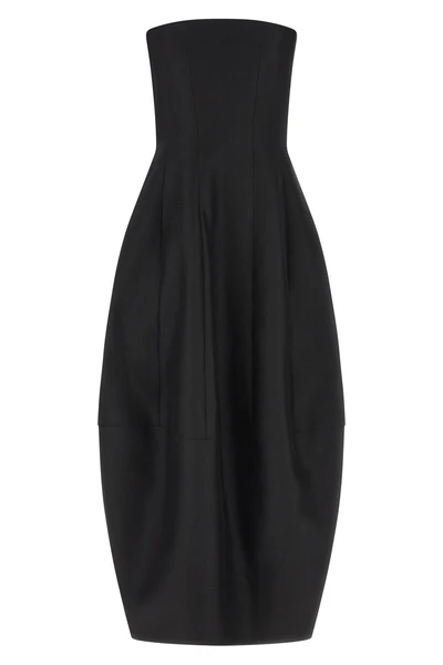 the long khaite stela dress defines a new architectural proportion through its