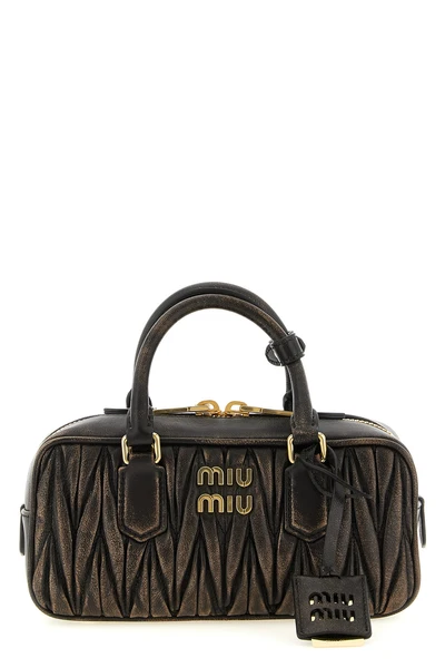 arcadie matelassé aged nappa leather handbag