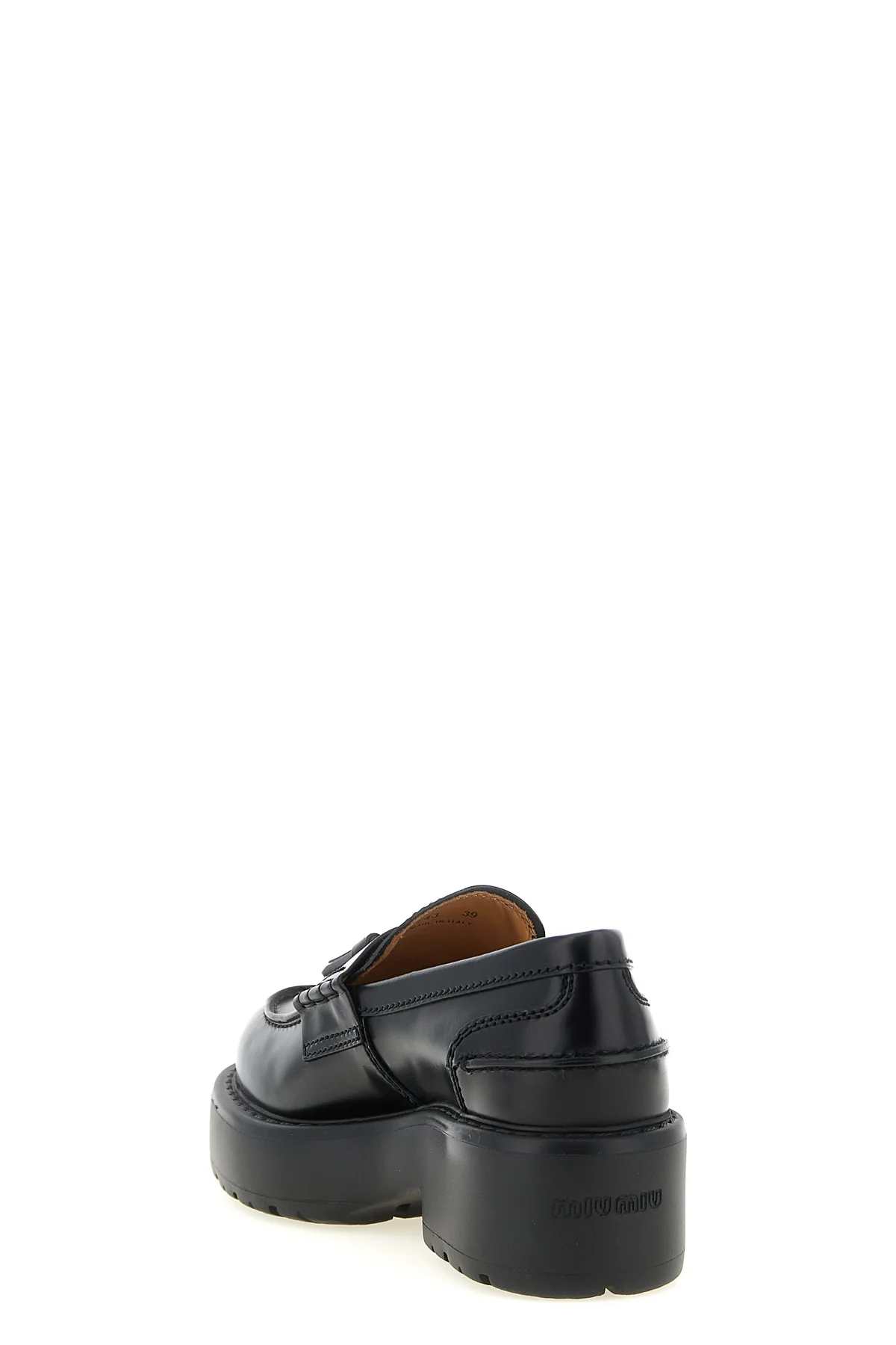 miu miu loafers in fine black calf leather reinterpret a wardrobe classic throug