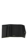 the miu miu compact black hammered leather wallet represents the essence of luxu