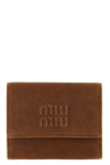 the miu miu small wallet in soft lambskin leather stands out for its compact and