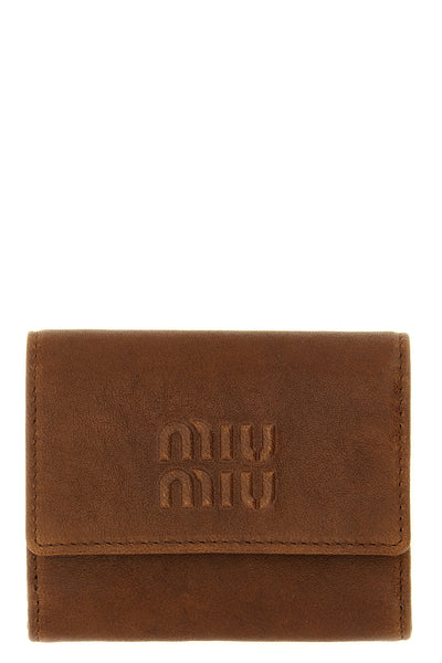the miu miu small wallet in soft lambskin leather stands out for its compact and
