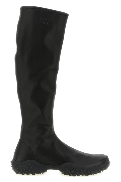 miu miu high boots in stretch nappa leather feature a tapered silhouette defined