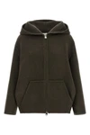 the khaite dolem jacket redefines the codes of outerwear through an oversized