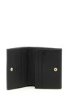 the gucci gg marmont mini wallet sets new standards of everyday luxury through a