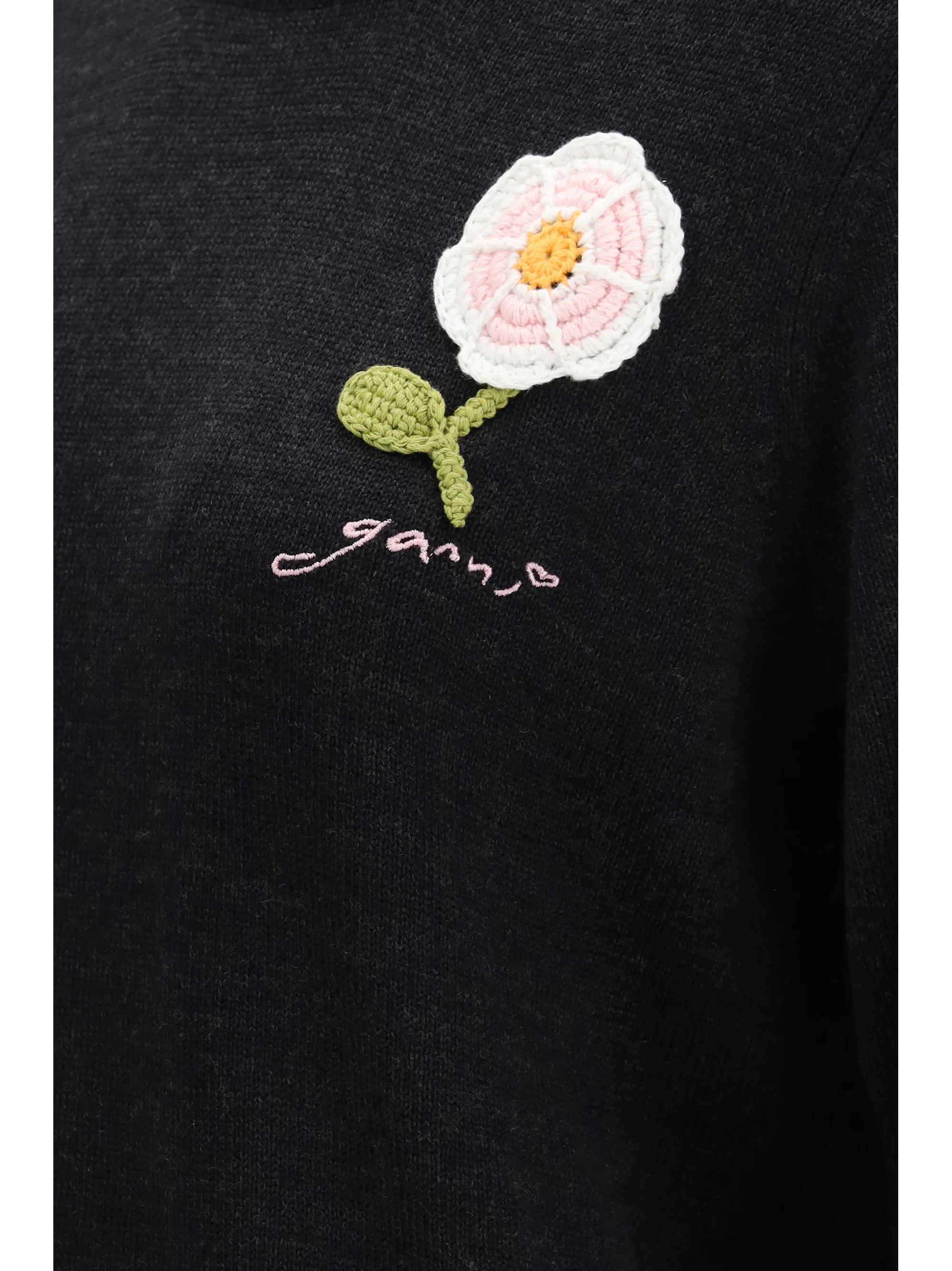 wool sweater with crochet flower