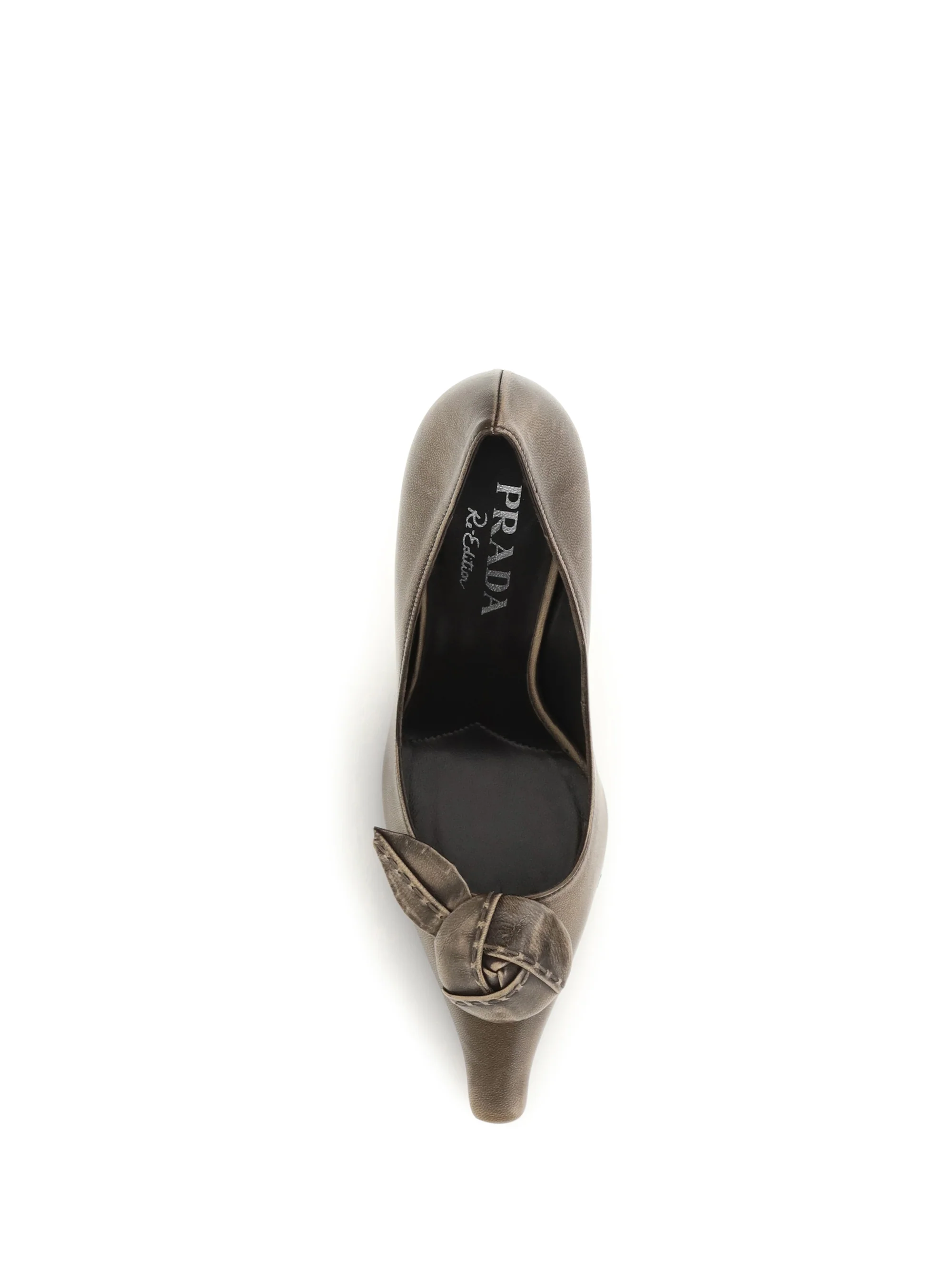 leather pumps with rose appliqué