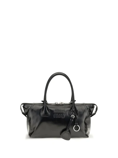 glossy leather handbag