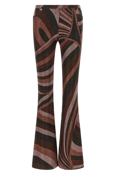the pucci trousers define a tight silhouette that opens into an elegant flared b