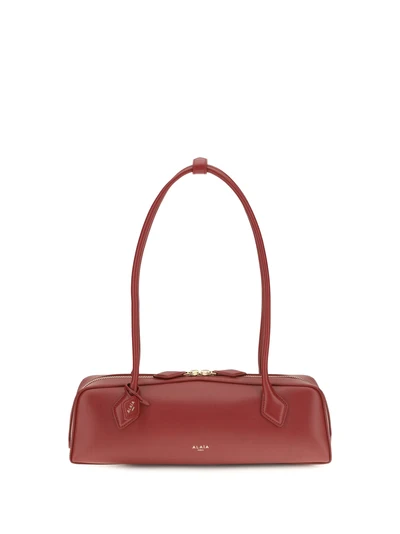 small le teckel shoulder bag