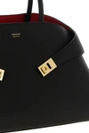 the ferragamo hug m handbag sets new standards of structured luxury through an