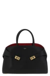 the ferragamo hug m handbag sets new standards of structured luxury through an