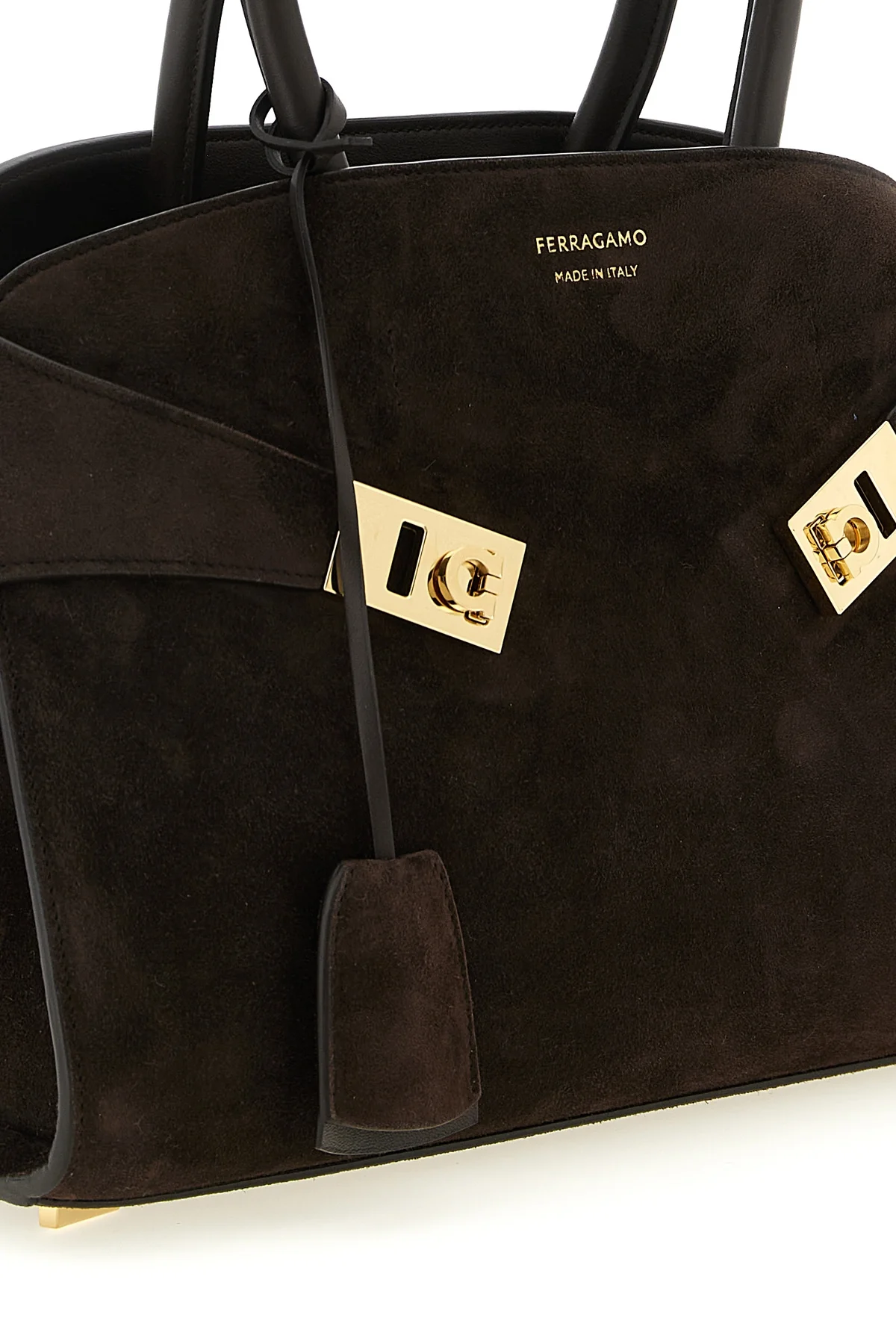 the ferragamo hug th (s) handbag sets new standards in sartorial architecture