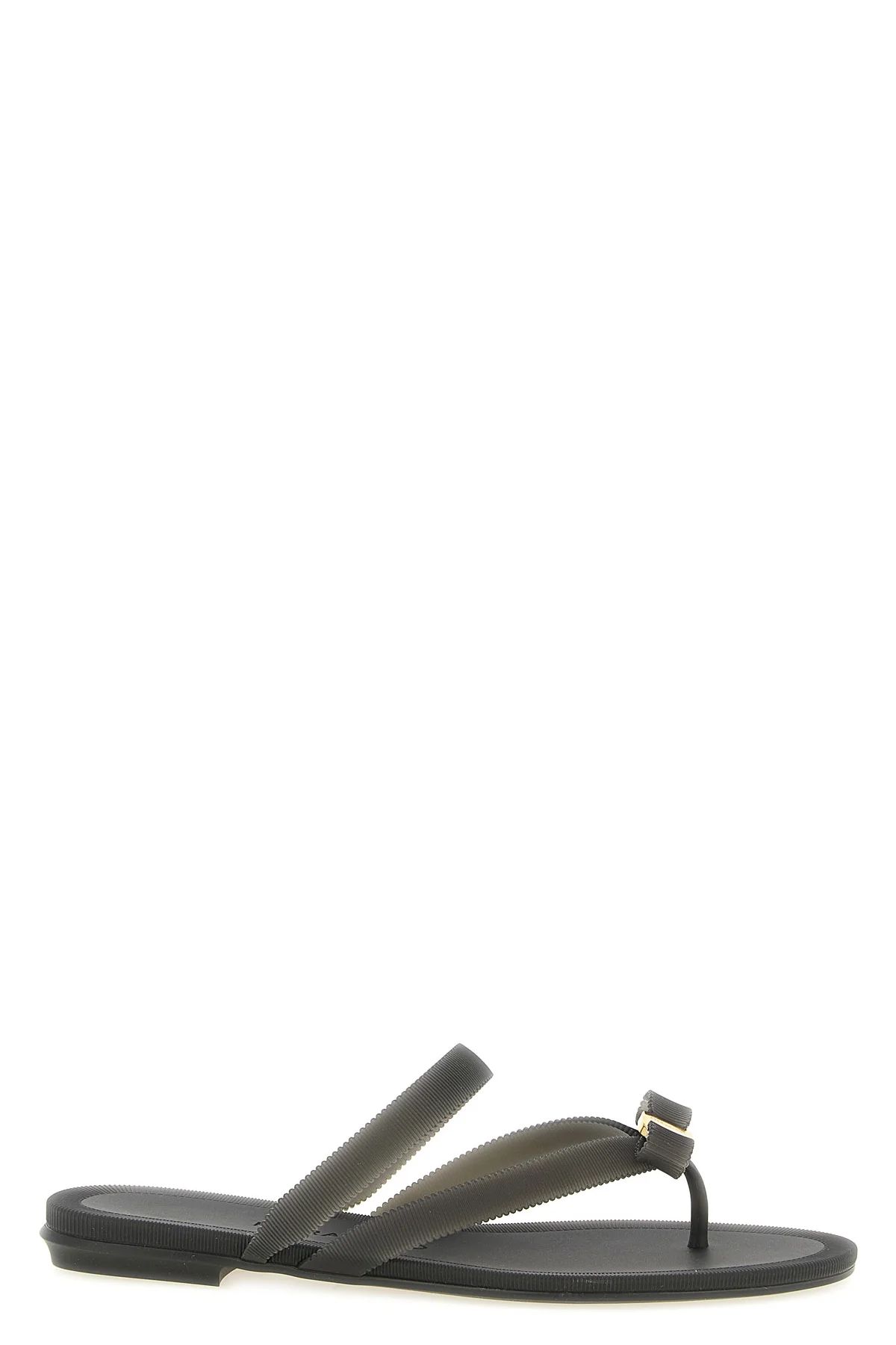 FERRAGAMO 5 the ferragamo jealsa thong sandal features a flat slip-on silhouette made of a