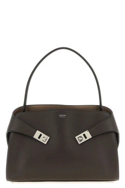 the ferragamo hug soft (m) shoulder bag stands out for its soft and enveloping