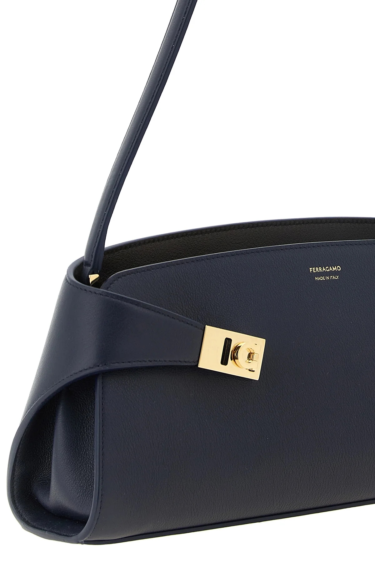 the ferragamo hug east-west shoulder bag stands out for its structured silhoue
