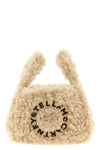 the stella mccartney shoulder bag redefines compact volumes through a sheepskin