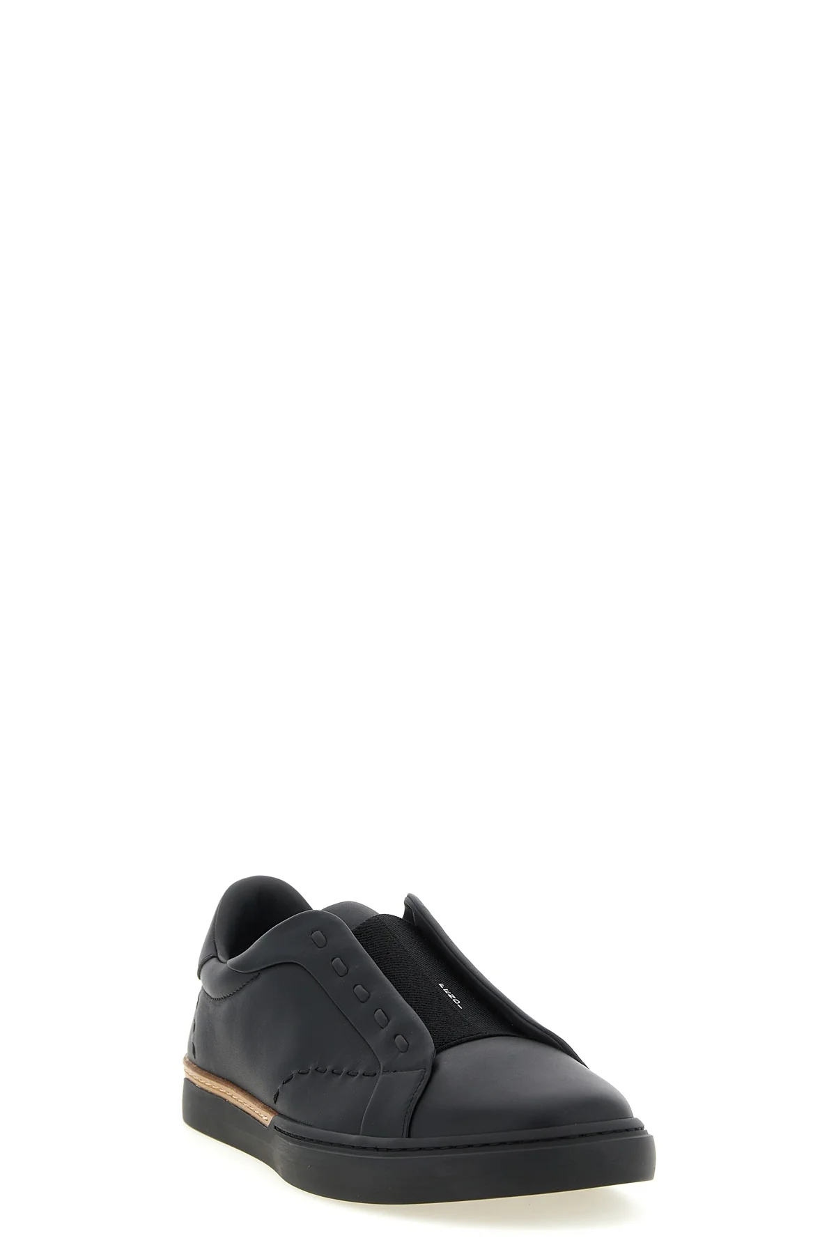the fendi city slip-on sneakers anchor contemporary footwear to a deep artisan