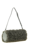 the stella mccartney clutch redefines everyday volumes through a geometric silho