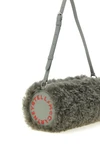 the stella mccartney clutch redefines everyday volumes through a geometric silho