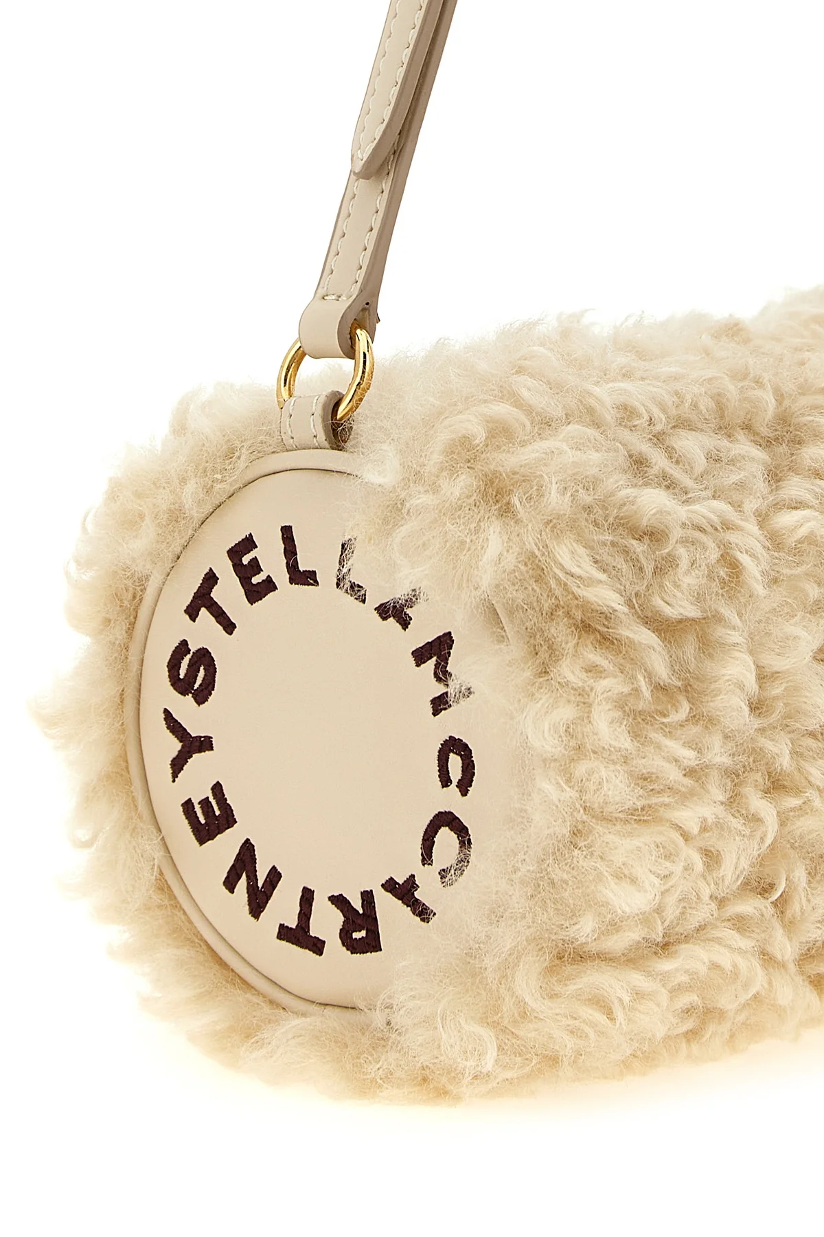 the stella mccartney clutch redefines everyday volumes through a structured cyli
