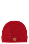 the vivienne westwood cap redefines winter accessories through a rich and envelo