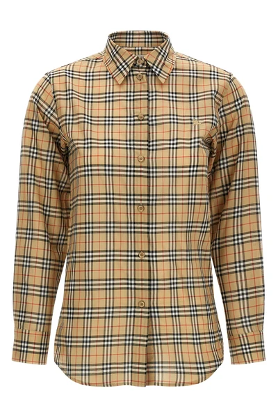 the burberry emma shirt redefines the codes of everyday elegance through metic