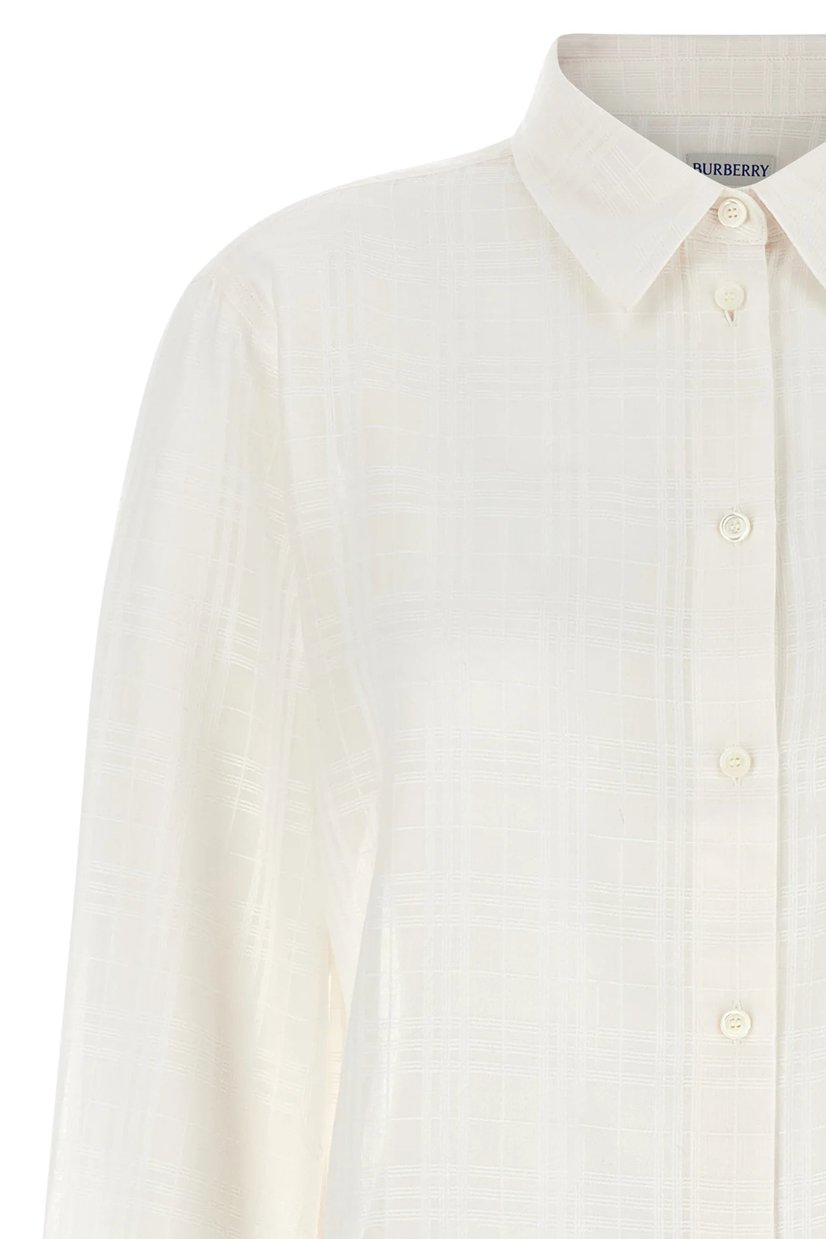 the burberry emma shirt redefines the codes of everyday elegance through metic