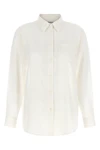 the burberry emma shirt redefines the codes of everyday elegance through metic