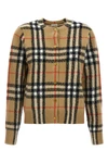 the burberry clara cardigan defines the codes of luxury knitwear through impec