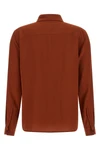 the saint laurent shirt in pure crepe de chine silk embodies a fluid and timeles