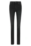gucci jeans redefine the everyday silhouette through precise sartorial construct