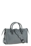 the balenciaga le city s handbag redefines the codes of urban elegance through