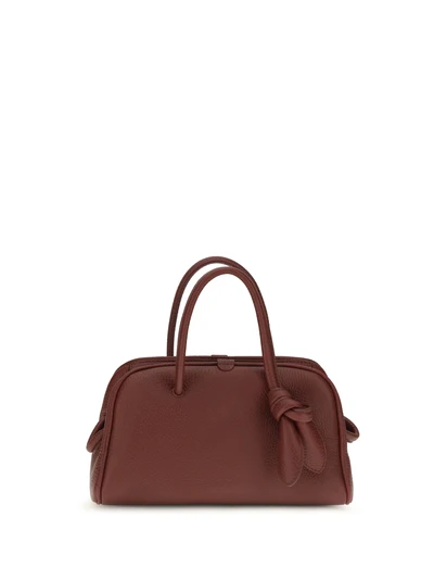 le petit turismo leather top handle bag