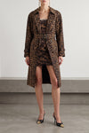 the saint laurent trench coat redefines the codes of outerwear through a bold an