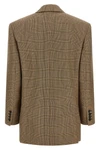 saint laurents double-breasted blazer expresses sartorial excellence through a