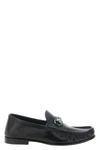 the gucci lugano loafers feature a structured interpretation of the classic sl