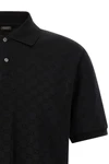 the black gucci polo shirt