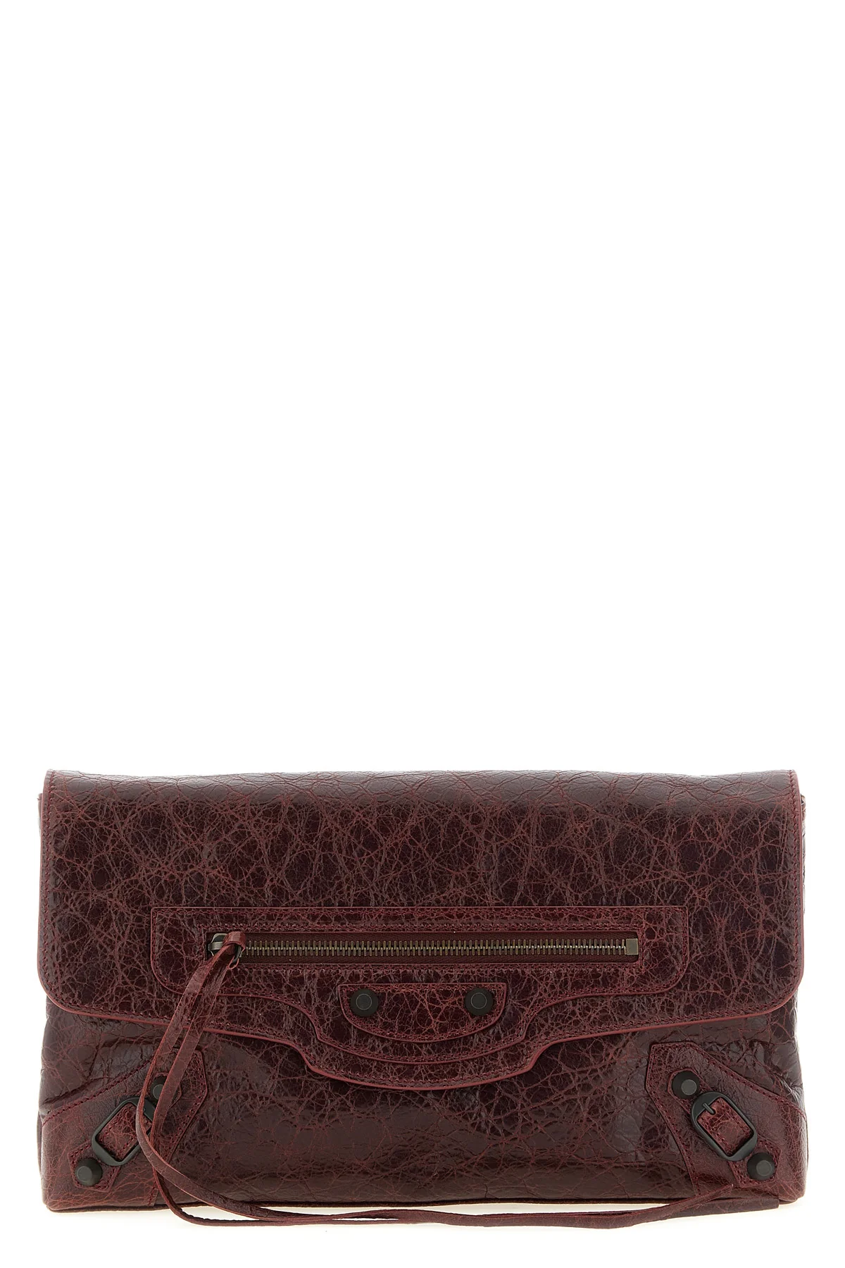 balenciagas le city clutch bag redefines urban elegance through a deconstruct