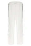 gucci leisure pants redefine everyday wear through a structured construction in
