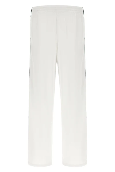 gucci leisure pants redefine everyday wear through a structured construction in