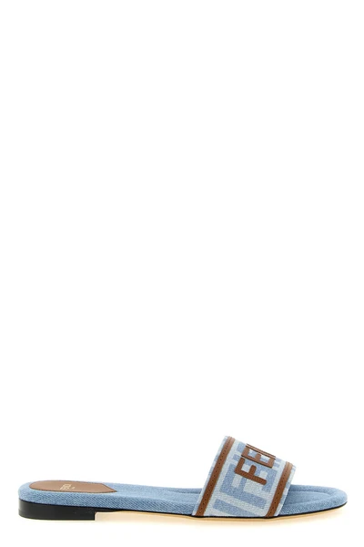 the fendi sunshine slide sandals are distinguished by a wide-band silhouette mad