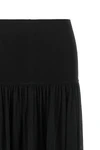 the zimmermann valiant long skirt defines a fluid silhouette through a play of