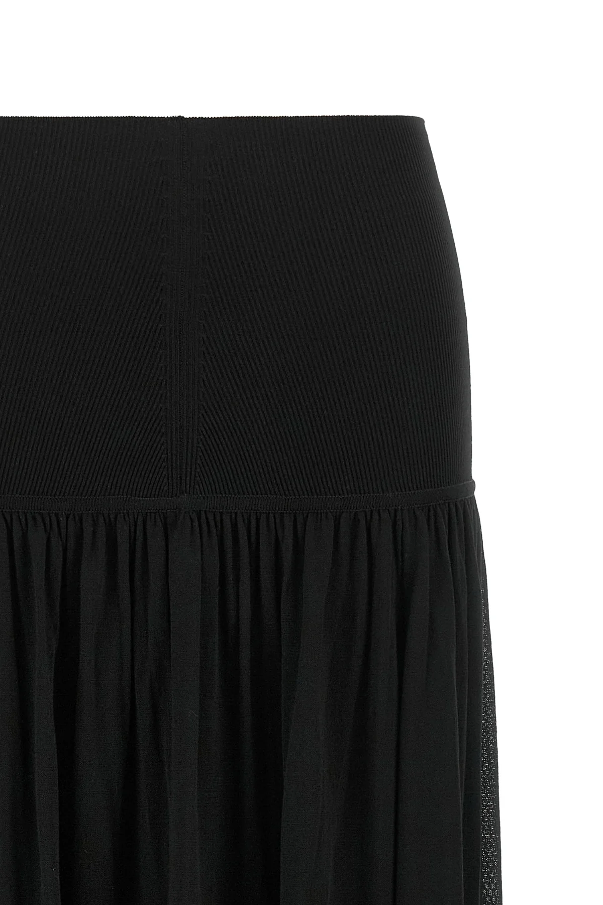 the zimmermann valiant long skirt defines a fluid silhouette through a play of