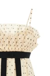 the zimmermann top defines a romantic silhouette through meticulous sartorial co