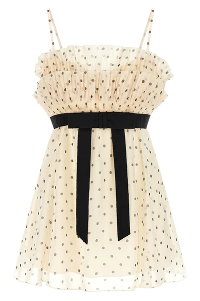 the zimmermann top defines a romantic silhouette through meticulous sartorial co